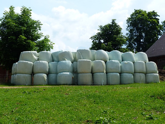 a large stack of hay bales